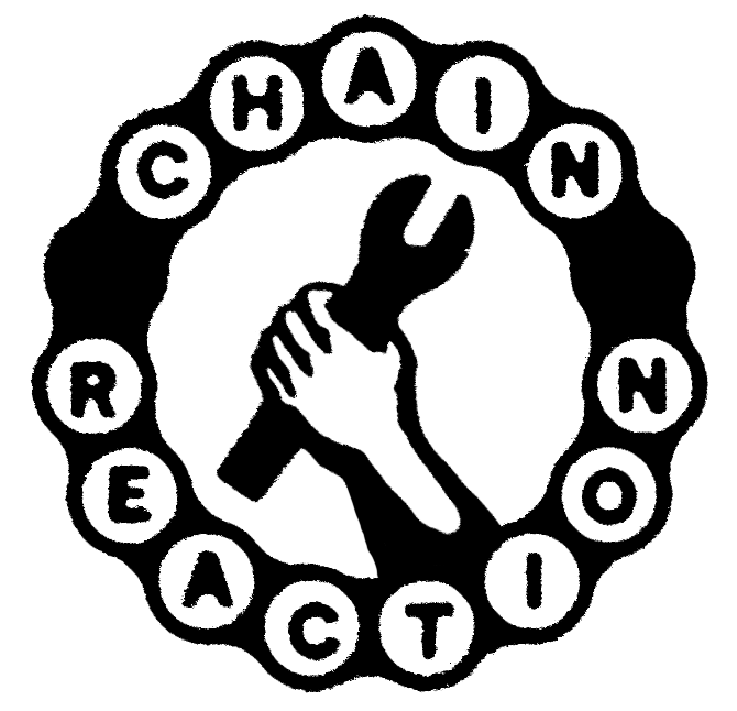 Logo of the workshop showing a circle made of bike chains and a hand holding a wrench, (probably a 15mm!), and rising it to the sky